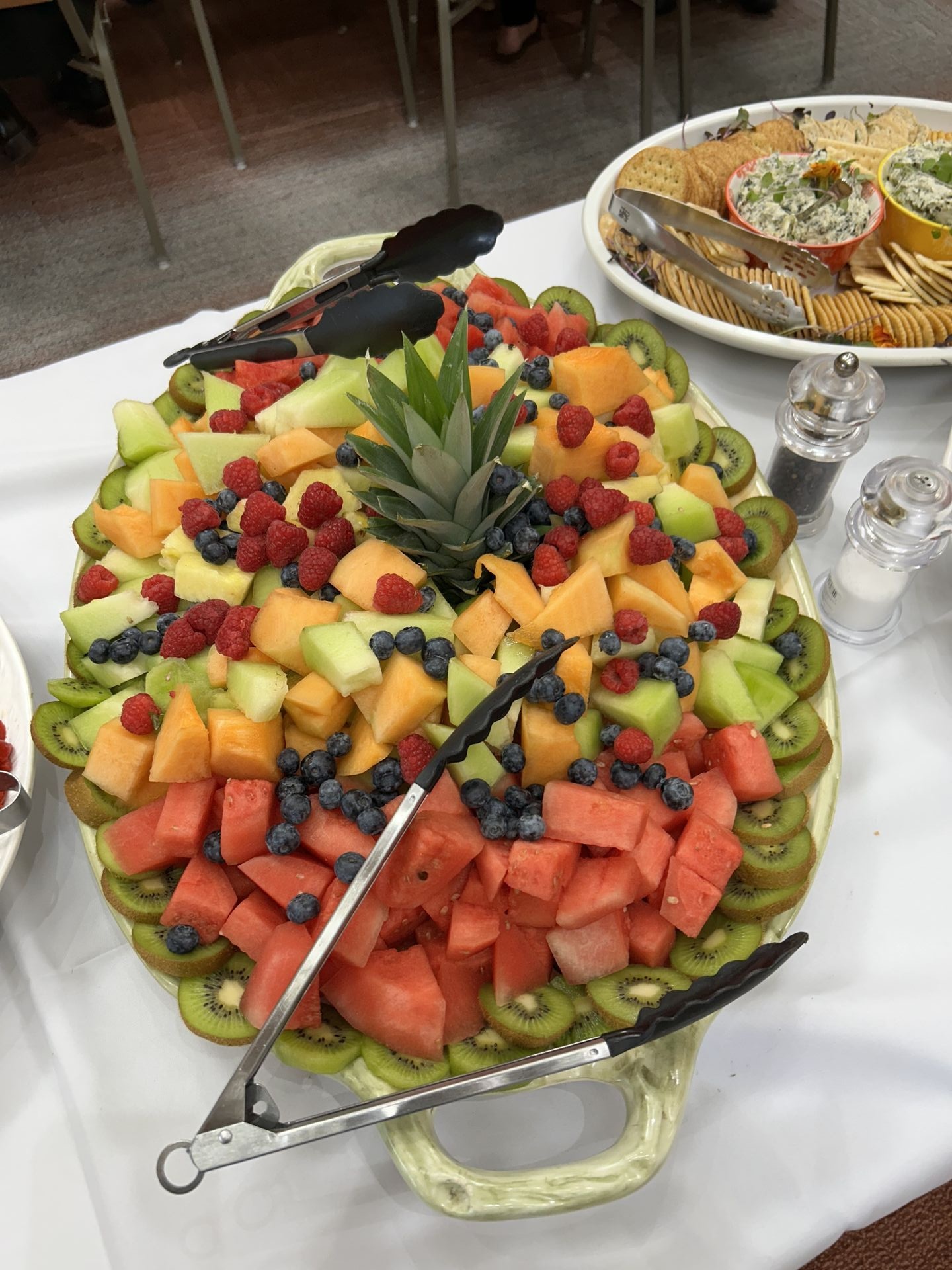 Vibrant cubed fruit tray with melons, berries