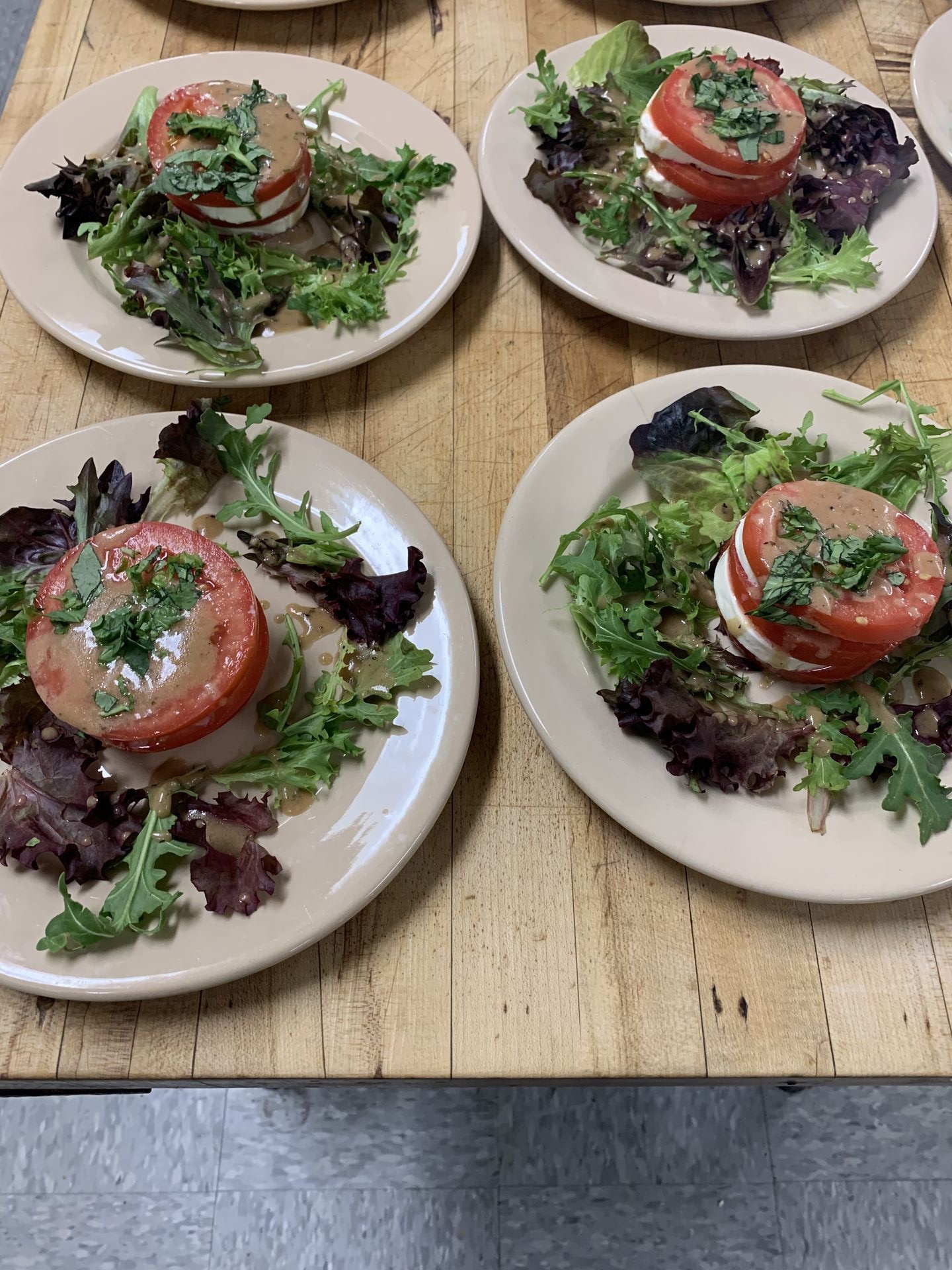 Fresh mixed green salad with tomatoes